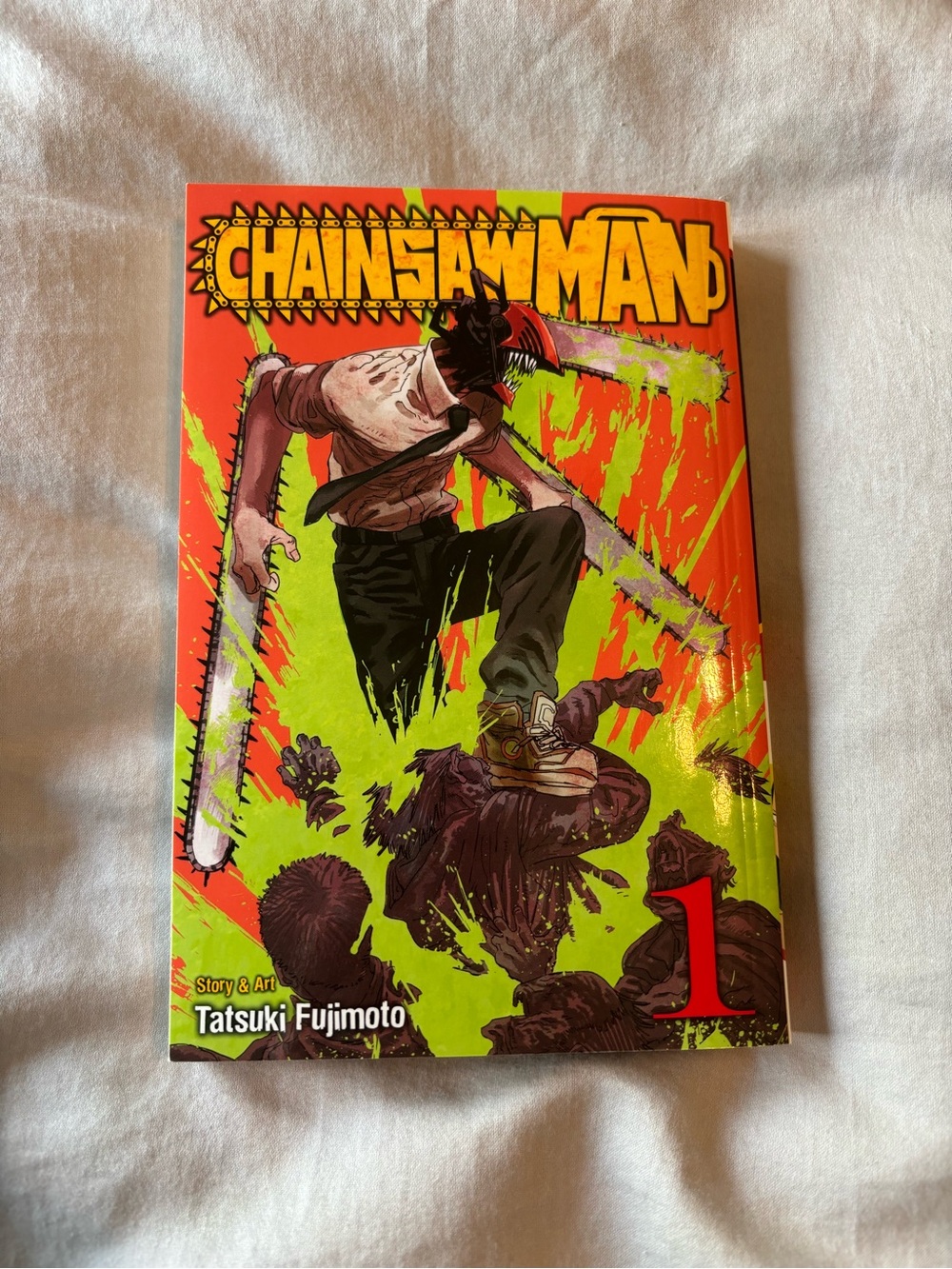 Chainsaw Man Vol. 1 Graphic Novel - Bright Orange & Green Cover
